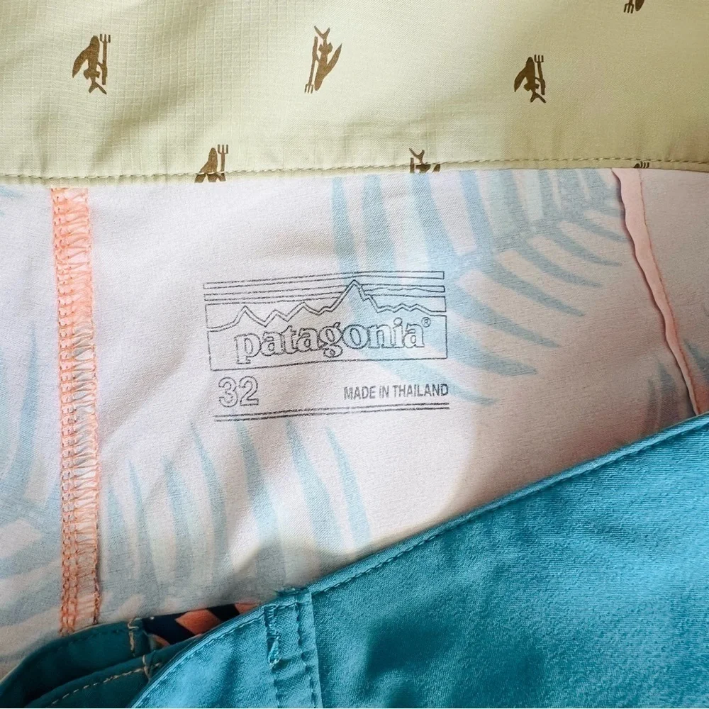 Patagonia Wavefarer boy shorts in coral palm leaves prints